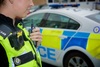 Police car and policewoman